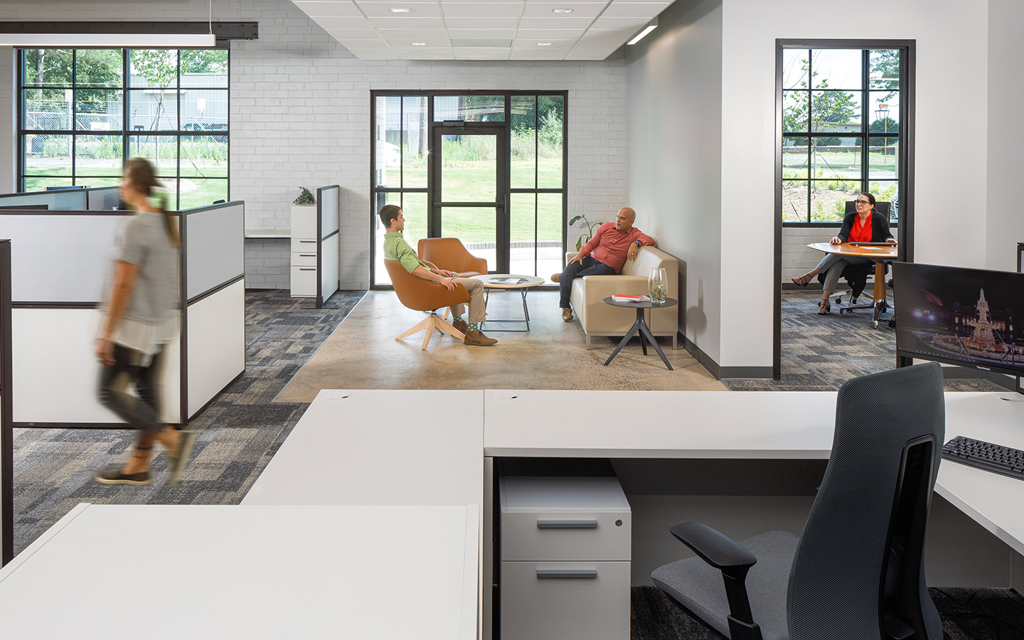 Cline Charlotte office showcasing social, desk, and office spaces