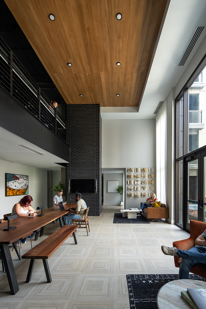 Double height amenity space with wood ceiling